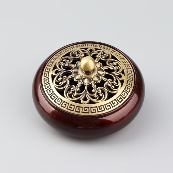 Exquisite Brass Incense Burner with Golden Lotus Design.