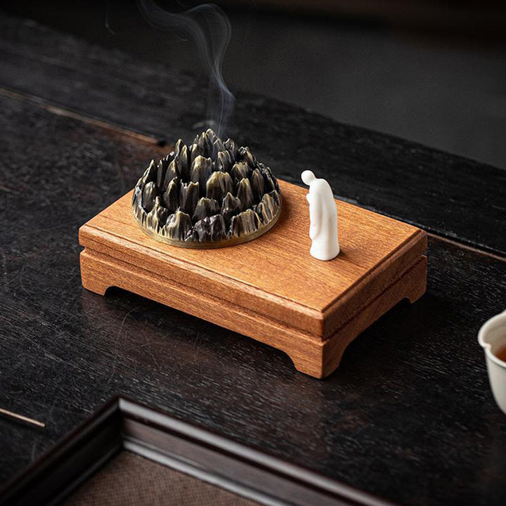 Mountain - Shaped Incense Burner with Monk Figurine.