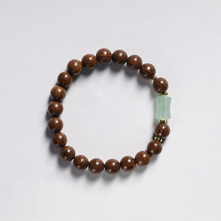 Handcrafted Golden Silk Sandalwood Beads Bracelet with Natural Nephrite Jade.