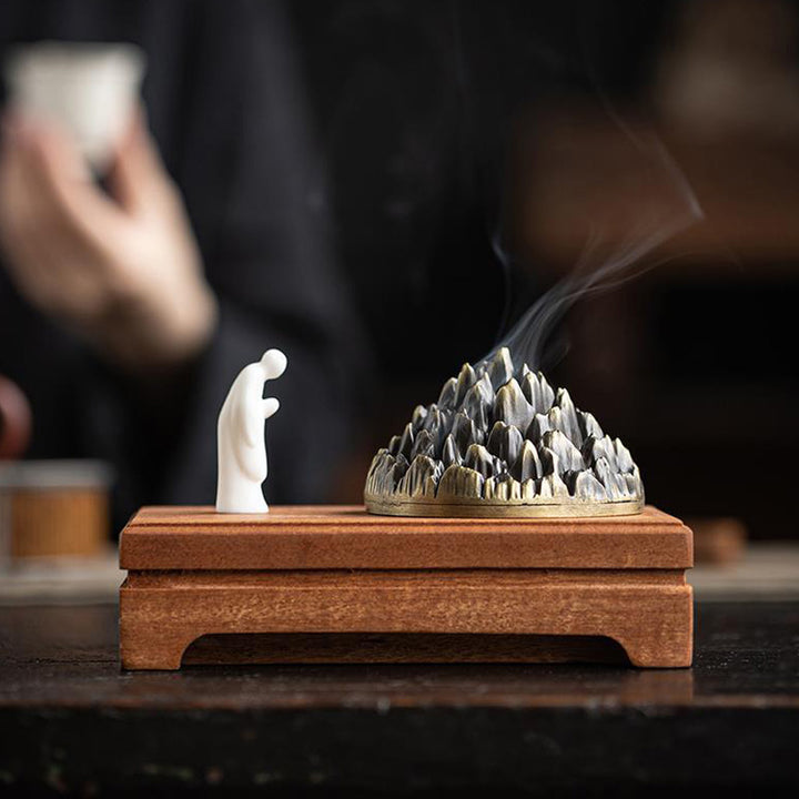 Mountain - Shaped Incense Burner with Monk Figurine.