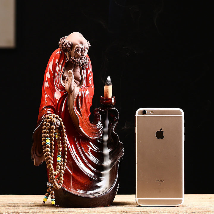 Exquisite Bodhidharma - themed Purple Clay Backflow Incense Burner.