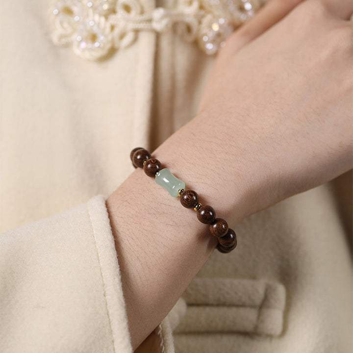 Handcrafted Golden Silk Sandalwood Beads Bracelet with Natural Nephrite Jade.