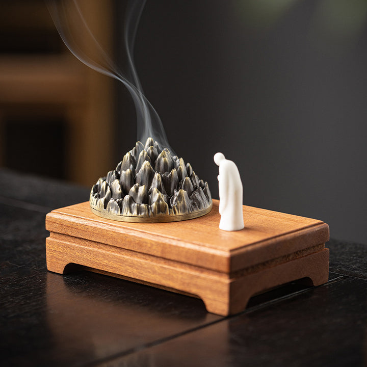 Mountain - Shaped Incense Burner with Monk Figurine.