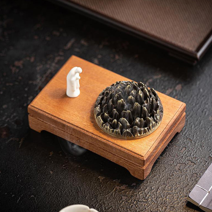 Mountain - Shaped Incense Burner with Monk Figurine.