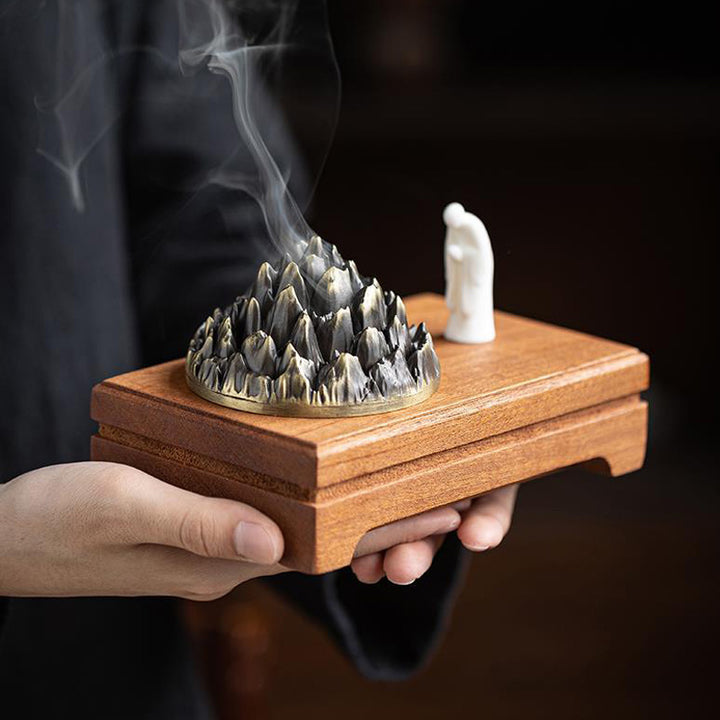 Mountain - Shaped Incense Burner with Monk Figurine.