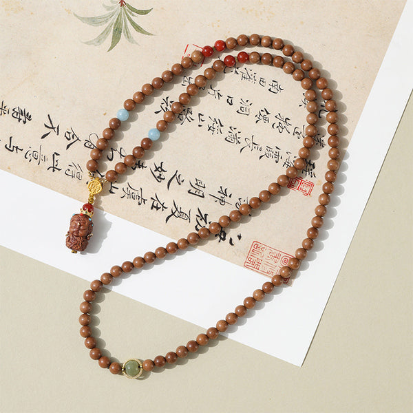 Sandalwood Bracelets - Hetian Nephrite, Beeswax Amber & Tara Pendants.