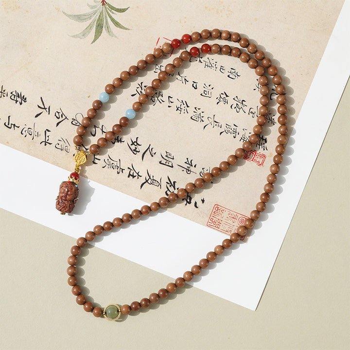 Sandalwood Bracelets - Hetian Nephrite, Beeswax Amber & Tara Pendants.