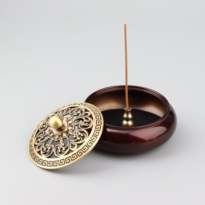 Exquisite Brass Incense Burner with Golden Lotus Design.