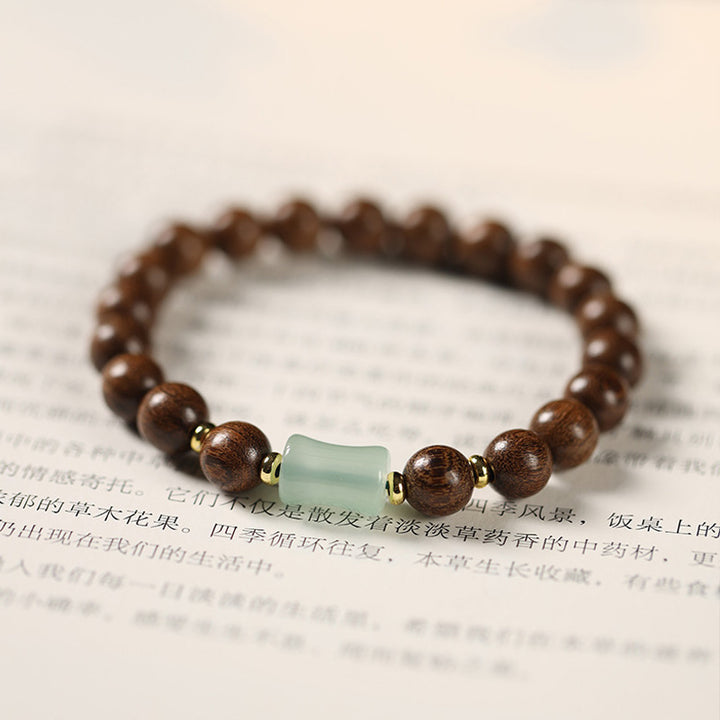 Handcrafted Golden Silk Sandalwood Beads Bracelet with Natural Nephrite Jade.