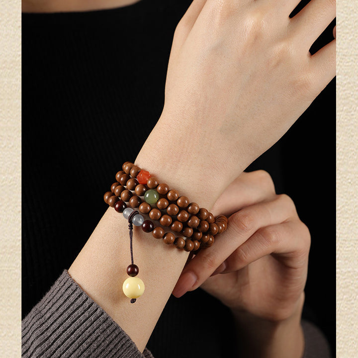 Sandalwood Bracelets - Hetian Nephrite, Beeswax Amber & Tara Pendants.