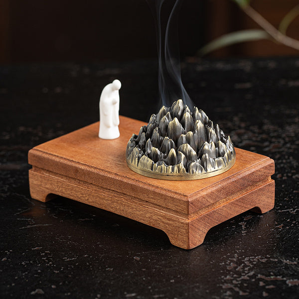 Mountain - Shaped Incense Burner with Monk Figurine.