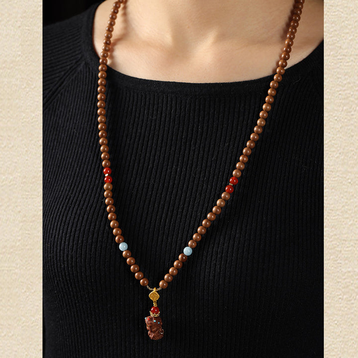 Sandalwood Bracelets - Hetian Nephrite, Beeswax Amber & Tara Pendants.