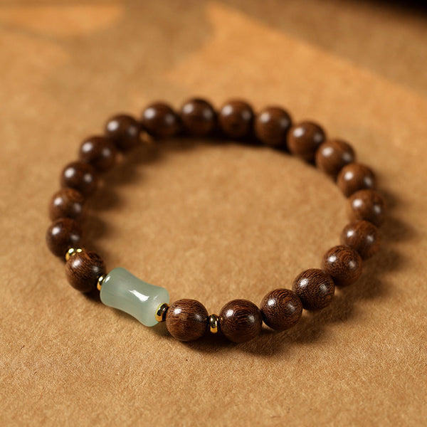 Handcrafted Golden Silk Sandalwood Beads Bracelet with Natural Nephrite Jade.
